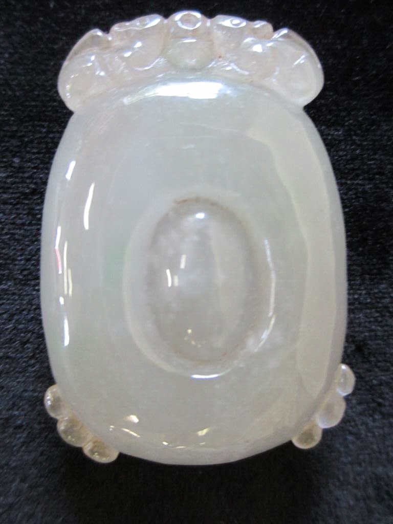 CHINESE CARVED JADE PENDANT: Chinese carved jade pendant . Facing squirrels or rats on top edge. H 2".