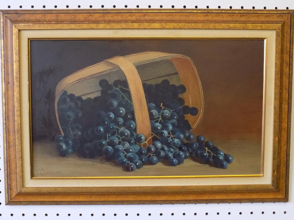 J.C. DANDA BLUEBERRIES BASKET STILL LIFE PAINTING: J.C. Danda - 19th Century still life painting of Blueberries in basket . Oil on artist board. Signed & dated 1893 lower left. McClees Galleries Philadelphia label en verso. H 12" x L 20". 16.50" x 24.