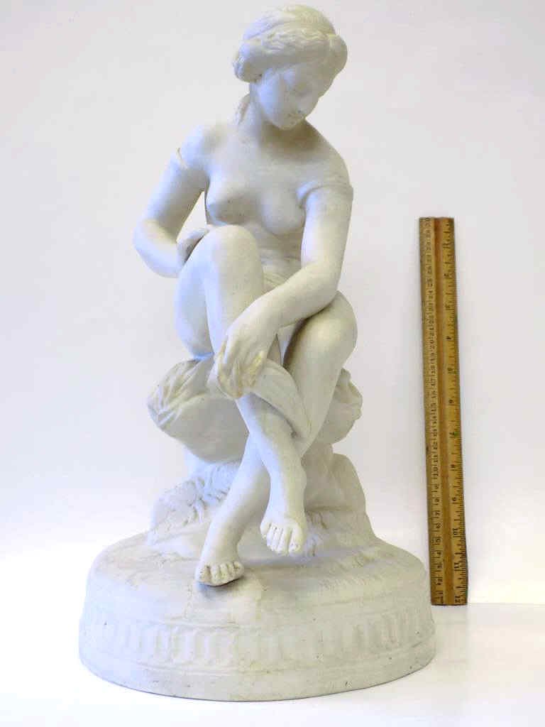 19TH CENTURY CLASSICAL LADY PARIAN STATUE: 19th Century Parian statue of a Classical nude seated lady . H 16"