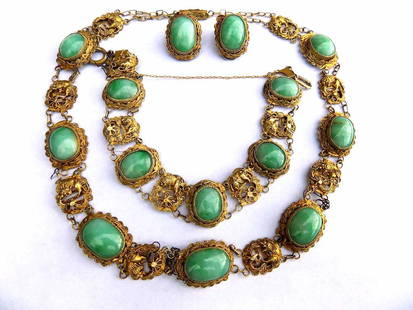 CHINESE JADE DRAGON FILIGREE JEWELRY SET Antique: Antique Chinese gold tone cabachoned jade jewelry set. Highly detailed filigree openwork depicting flying dragons above Lotus plants. Matching necklace, bracelet and pair of earrings. Bracelet marked