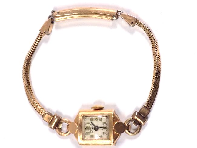 ART DECO HALGREEN 14K GOLD LADIES WATCH: Antique Art Deco Halgreen 14k yellow gold 17 Jewel Ladies watch. Gold filled band.