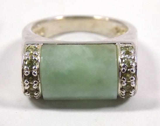 CHINESE STERLING SILVER JADE RING: Elegant Chinese Green & White Jade Sterling Silver ring. Marked China 925. Size 5.