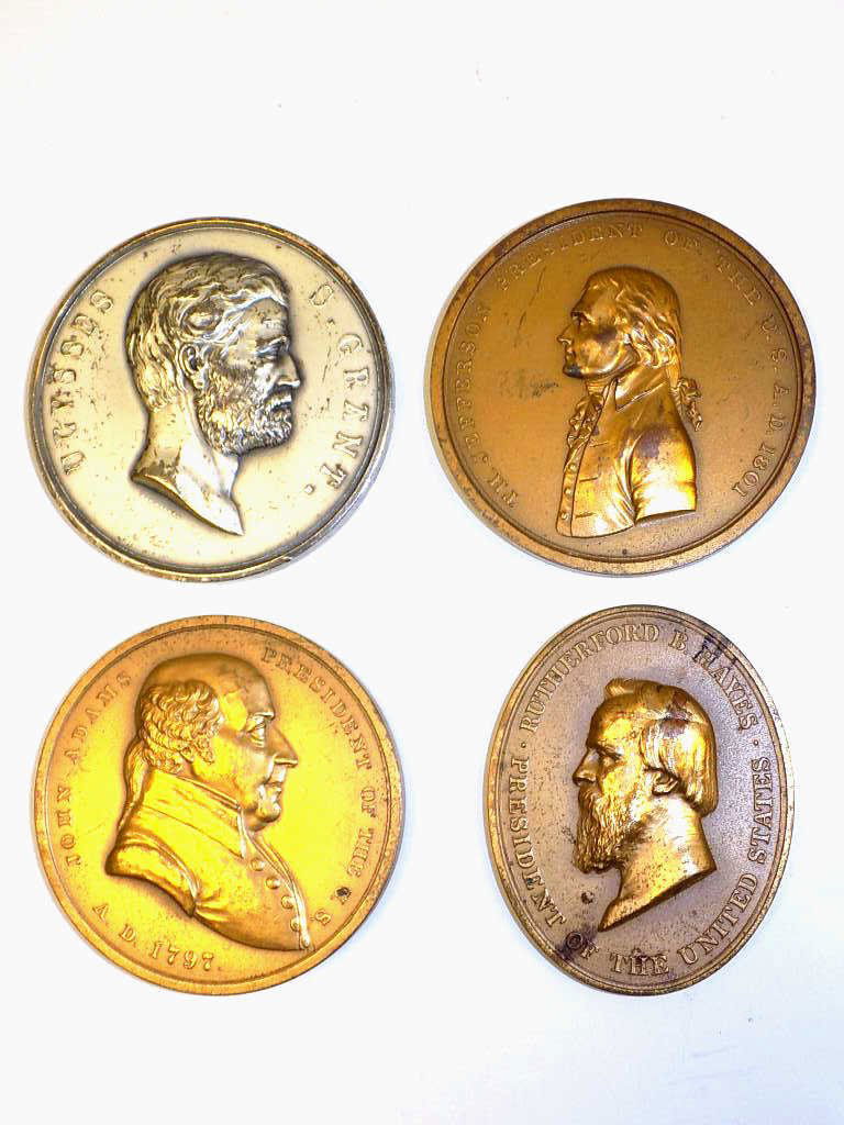 PRESIDENTIAL BRONZE MEDALLIONS GROUP Group of 4: Group of 4 Presidential bronze medallions consisting of: Ulysses S. Grant, John Adams, Thomas Jefferson, Rutherford Hayes.