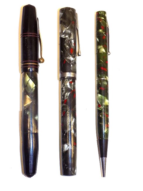 WATERMANS FOUNTAIN PENS GROUP Antique group of Fountain: Antique group of Fountain pens including: Watermans Ideal 4 Silver pearl & Red w/ silver mounts, Deco green gold & pearl Fifth Avenue, Watermans Green & Red pearl mechanical pencil w/ silver mounts.