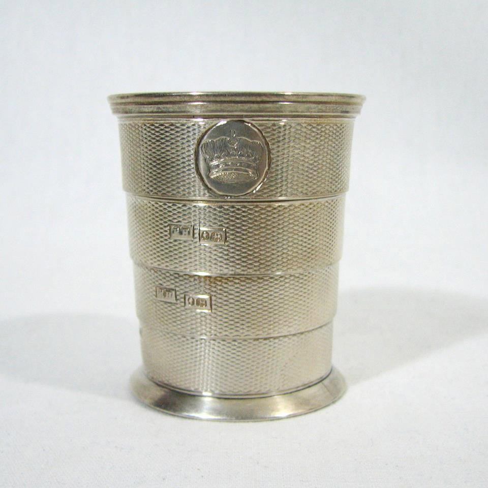 Vintage Sterling Silver collapsible cup. Hallmark: English Sterling Silver cup, completely collapsible. Hallmarked on every section that collapses. Extraordinary detail. Marked on the base: Briggs 27 Piccadilly. Measures 2 3/8 inches high when opened,