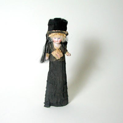 Edwardian Mourning Doll: 1910s Mourning Doll, Porcelain and Crepe Paper. Incredibly hard to find in good condition. Charming antique doll of very delicate materials. All original. No restoration done.