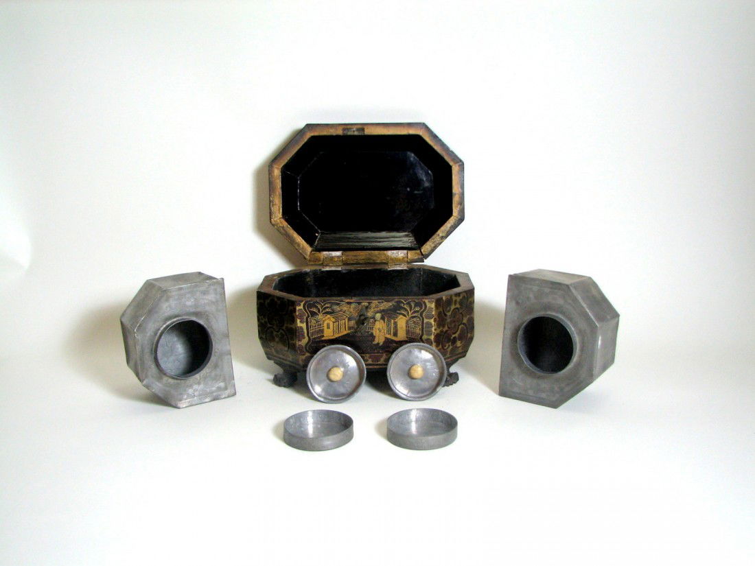 Antique Tea Caddy Box, Asian Scene: Hand painted wooden octagonal footed box with working lock and key. Hinged lid opens to reveal two metal containers, each double-lidded and made of stamped tin. Box has some small dents and two seams