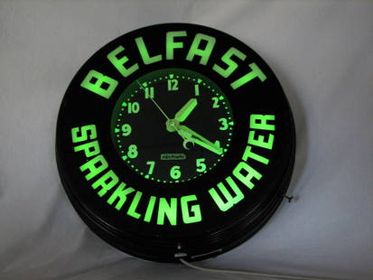 Vintage Neon Advertising Clock, Glo Dial Belfast: Fantastic advertising piece in the form of a wall clock. For a vintage water company: Belfast Sparkling Water. Neon tubes work well. Clock hands turn properly. Marked on the face: Glo Dial Clock Co