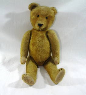 Antique Mohair Teddy Bear: Charming antique teddy bear. Made of mohair with glass eyes. Pronounced hump. He smells fresh, from a non smoking estate. He measures 22 inches high x 9 inches wide (at his shoulders).