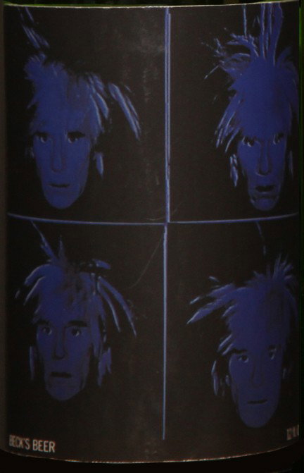 Self-Portrait: Closed bottle. Front label displays the self-portrait and the back label displays the year. Each bottle comes with their own showcase. (does not include bottle in the picture)