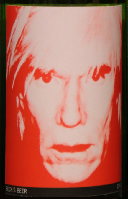 Self-Portrait: Closed bottle. Front label displays the self-portrait and the back label displays the year. Each bottle comes with their own showcase. (does not include bottle in the picture)