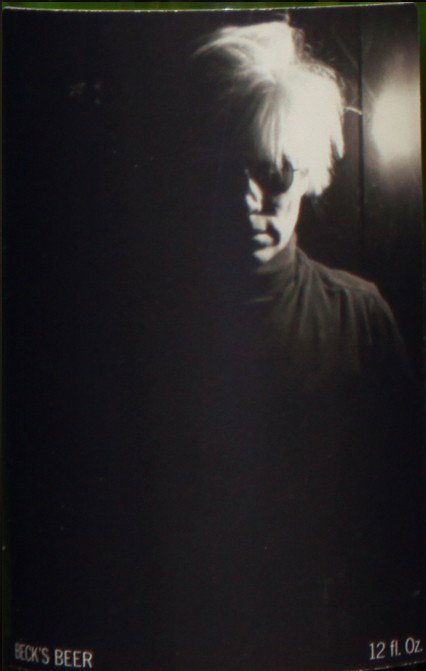Self-Portrait: Closed bottle. Front label displays the self-portrait and the back label displays the year. Each bottle comes with their own showcase. (does not include bottle in the picture)