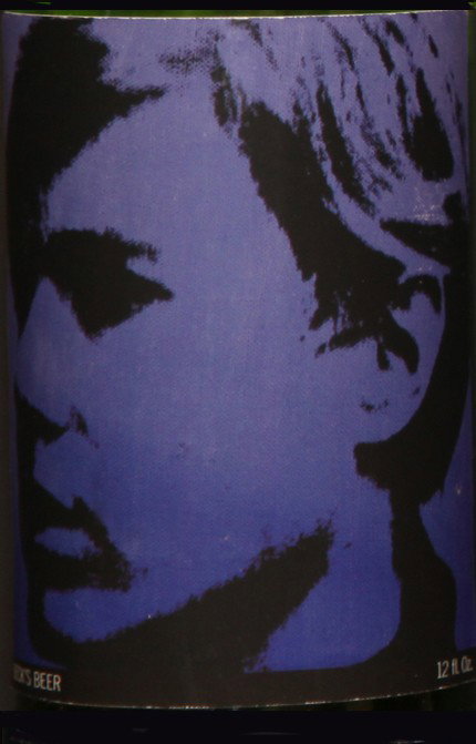 Self-Portrait: Closed bottle. Front label displays the self-portrait and the back label displays the year. Each bottle comes with their own showcase. (does not include bottle in the picture)
