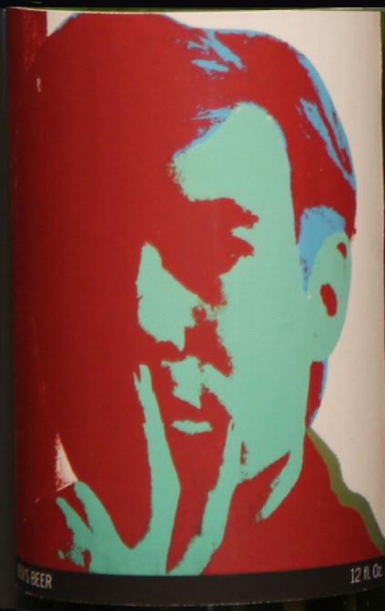 Self-Portrait: Closed bottle. Front label displays the self-portrait and the back label displays the year. Each bottle comes with their own showcase. (does not include bottle in the picture)