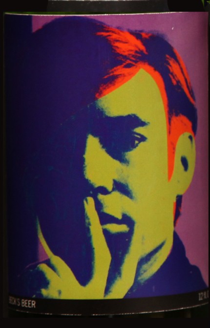 Self-Portrait: Closed bottle. Front label displays the self-portrait and the back label displays the year. Each bottle comes with their own showcase. (does not include bottle in the picture)