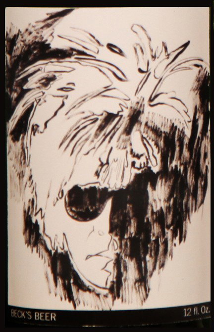 Self-Portrait: Closed bottle. Front label displays the self-portrait and the back label displays the year. Each bottle comes with their own showcase. (does not include bottle in the picture)