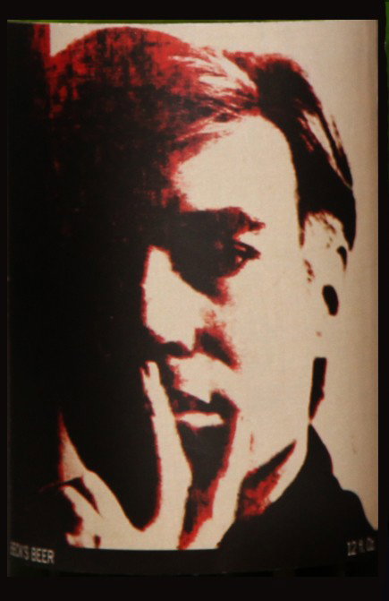 Self-Portrait: Closed bottle. Front label displays the self-portrait and the back label displays the year. Each bottle comes with their own showcase. (does not include bottle in the picture)