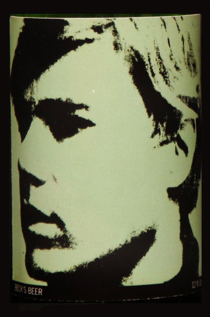 Self-Portrait: Closed bottle. Front label displays the self-portrait and the back label displays the year. Each bottle comes with their own showcase. (does not include bottle in the picture)