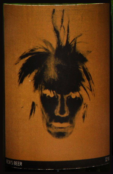 Self-Portrait: Closed bottle. Front label displays the self-portrait and the back label displays the year. Each bottle comes with their own showcase. (does not include bottle in the picture)