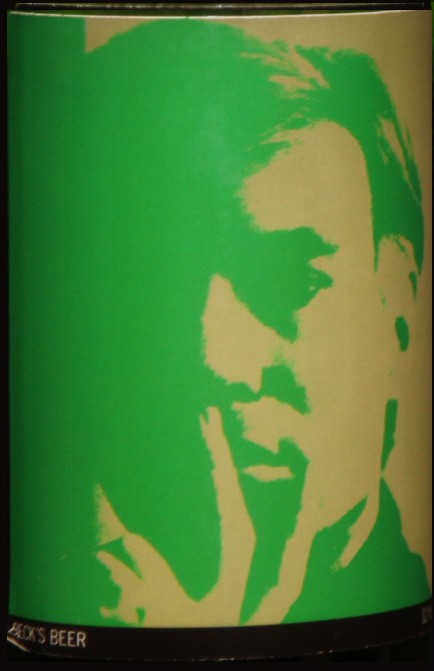 Self-Portrait: Closed bottle. Front label displays the self-portrait and the back label displays the year. Each bottle comes with their own showcase. (does not include bottle in the picture)