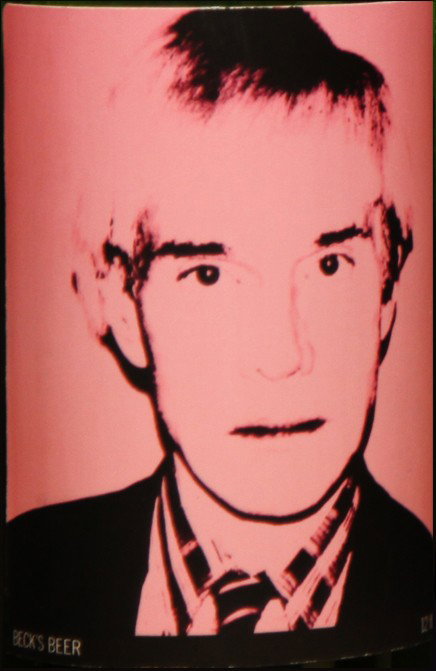 Self-Portrait: Closed bottle. Front label displays the self-portrait and the back label displays the year. Each bottle comes with their own showcase. (does not include bottle in the picture)