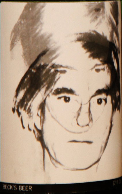 Self-Portrait: Closed bottle. Front label displays the self-portrait and the back label displays the year. Each bottle comes with their own showcase. (does not include bottle in the picture)