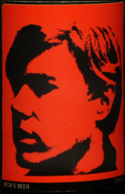 Self-Portrait: Closed bottle. Front label displays the self-portrait and the back label displays the year. Each bottle comes with their own showcase. (does not include bottle in the picture)
