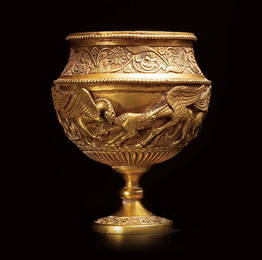 AN ARCHAIC GILT-BRONZE ''MYTHICAL BEAST AND HORSE' CUP