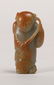 A CARVED WHITE JADE BOY HOLDING LOTUS, QING DYNASTY