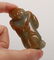A CARVED WHITE JADE BOY HOLDING LOTUS, QING DYNASTY - 7
