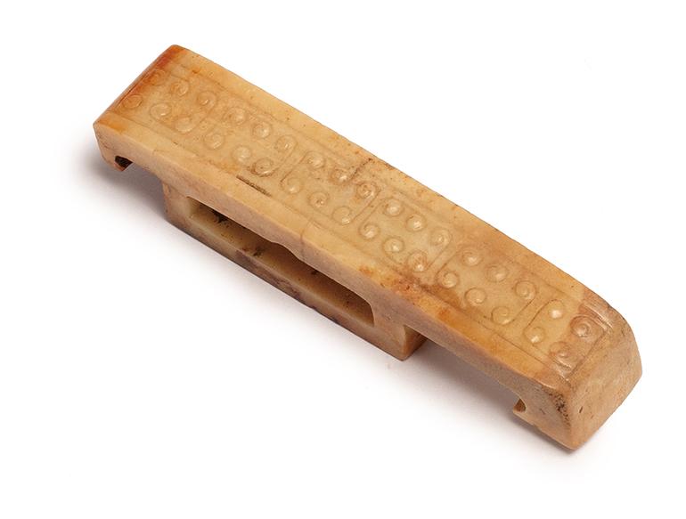 A CARVED JADE SWORD GUARD, MING DYNASTY (1 of 8)