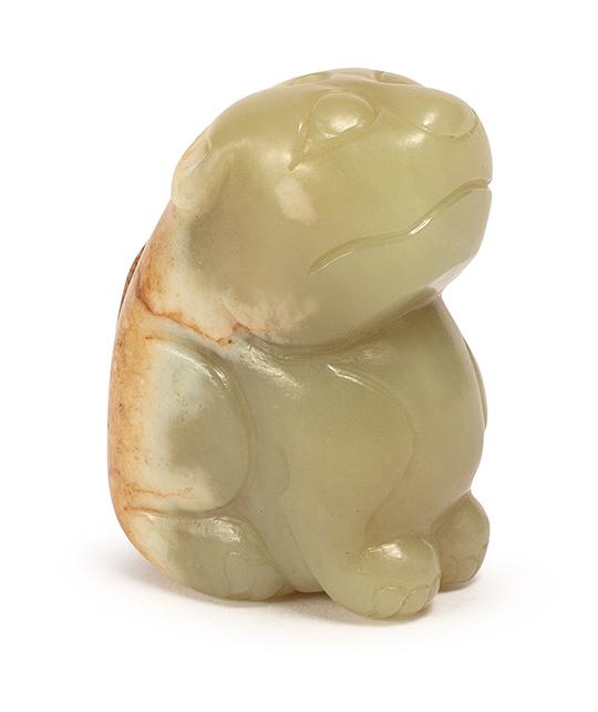 A CARVED YELLOW JADE MYTHICAL BEAST, MING DYNASTY (1 of 7)