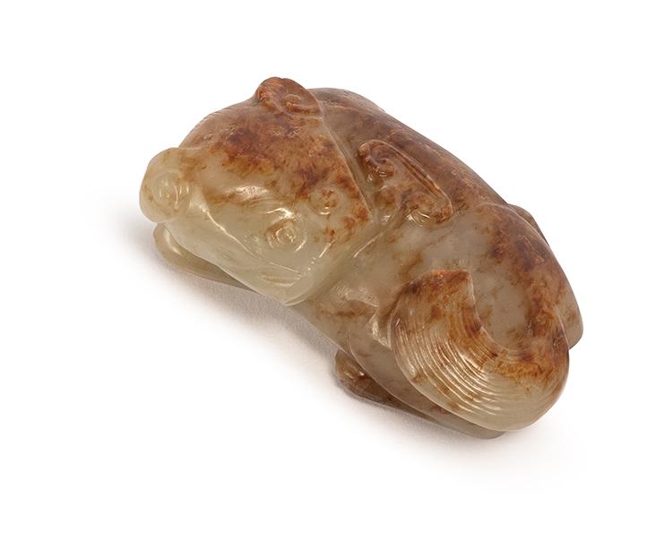 A WHITE AND RUSSET JADE MYTHICAL BEAST, MING DYNASTY (1 of 7)