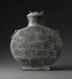 AN ARCHAIC BRONZE COPPER- INLAID WINE VESSELï¼Œ WARRING STATES PERIOD