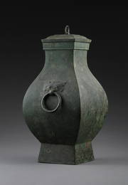 AN ARCHAIC BRONZE SQUARE POT, EARLY WESTERN HAN