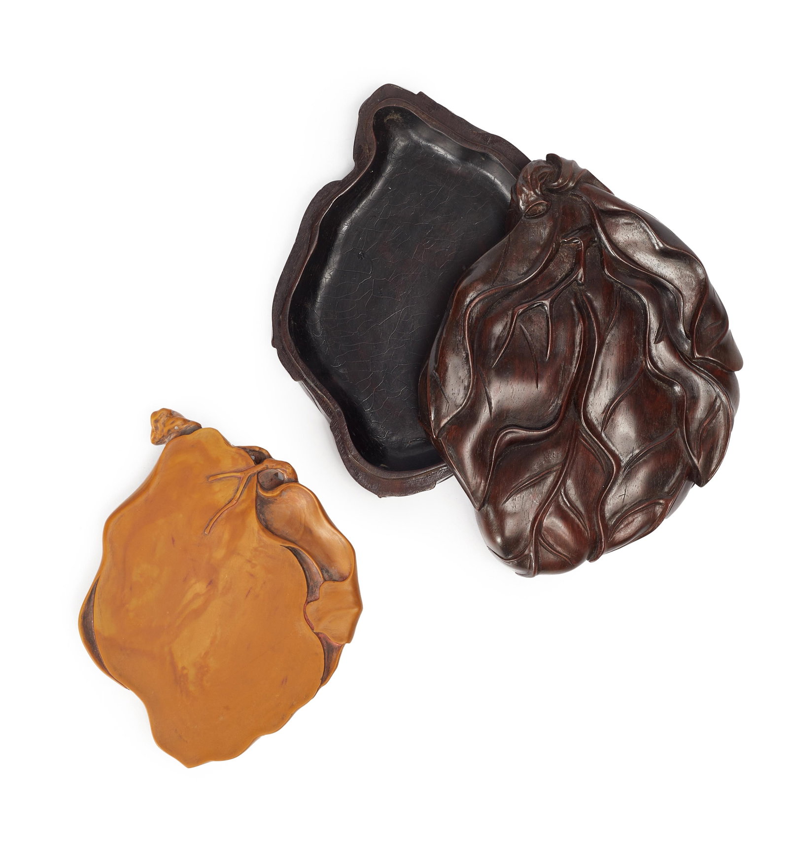 AN INKSTONE: Length:14.3 cm