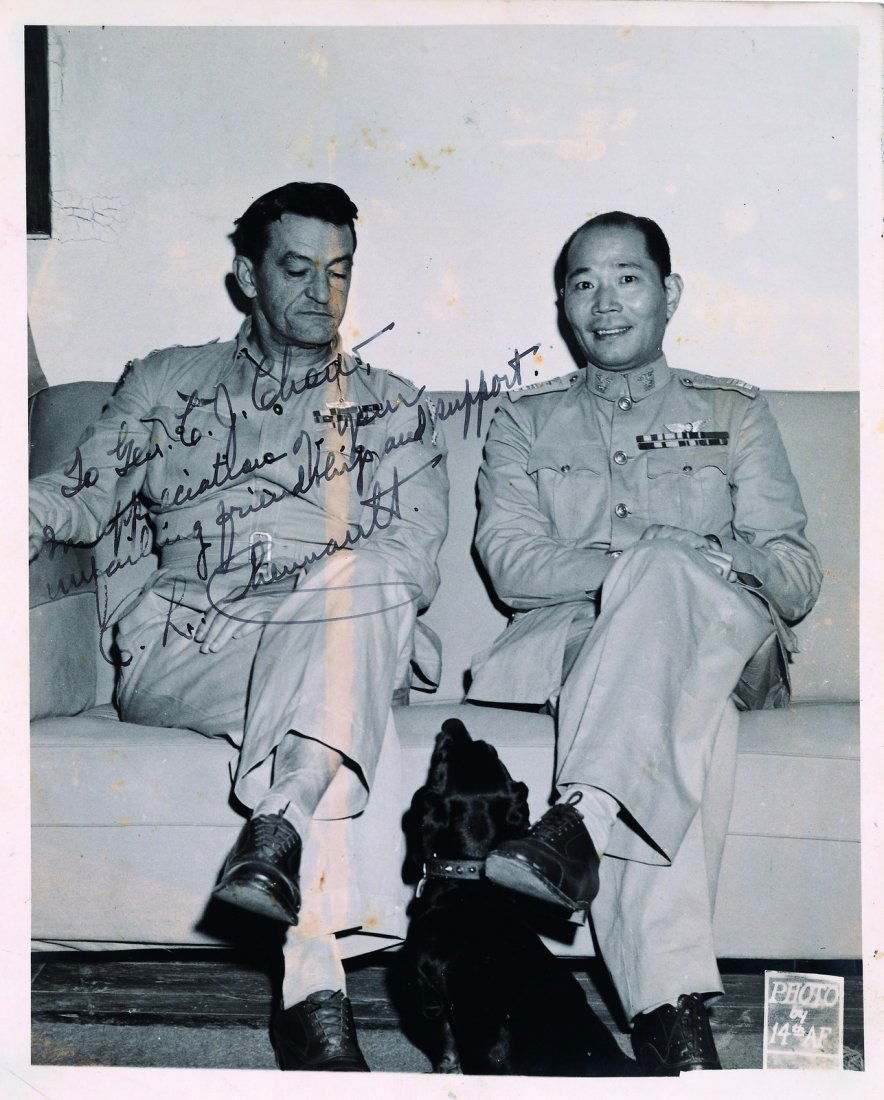 AUTOGRAPHED PHOTOGRAPH OF ZHOU ZHI ROU WITH CLAIRE LEE: 20.6x25.4 cm