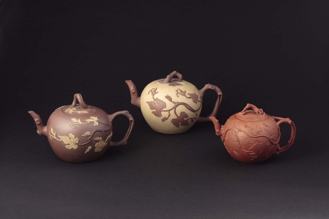A Set Of Three Pottery Teapots (1 of 10)