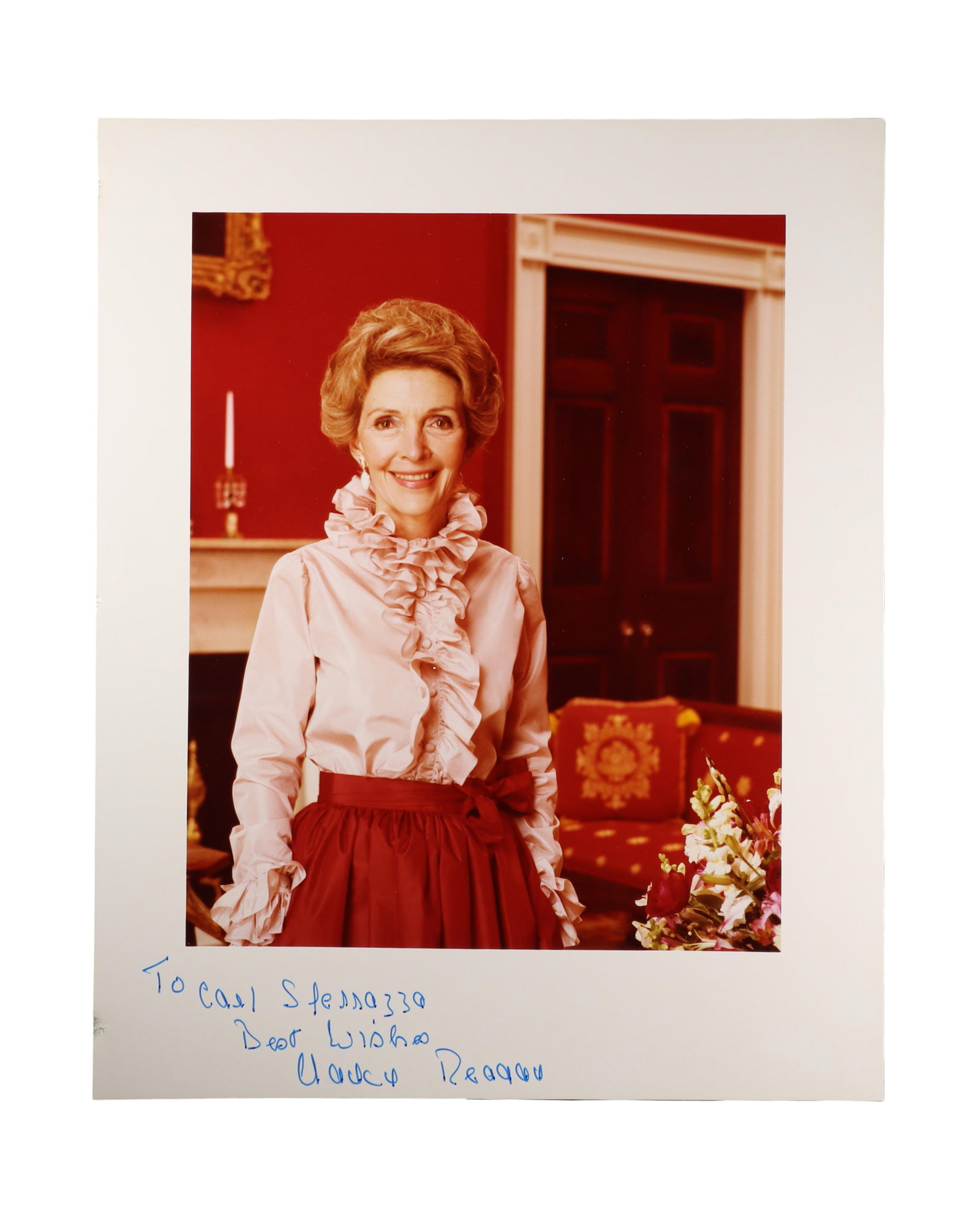 NANCY REAGAN SIGNED WHITE HOUSE LETTER AND SIGNED COLOR PHOTOGRAPH: October 29, 1985 A two piece suite addressed to the same recipient. The first piece is a typed letter signed by Nancy Reagan on White House letterhead, dated October 29, 1985, to Mr. Carl Sferrazza, 1