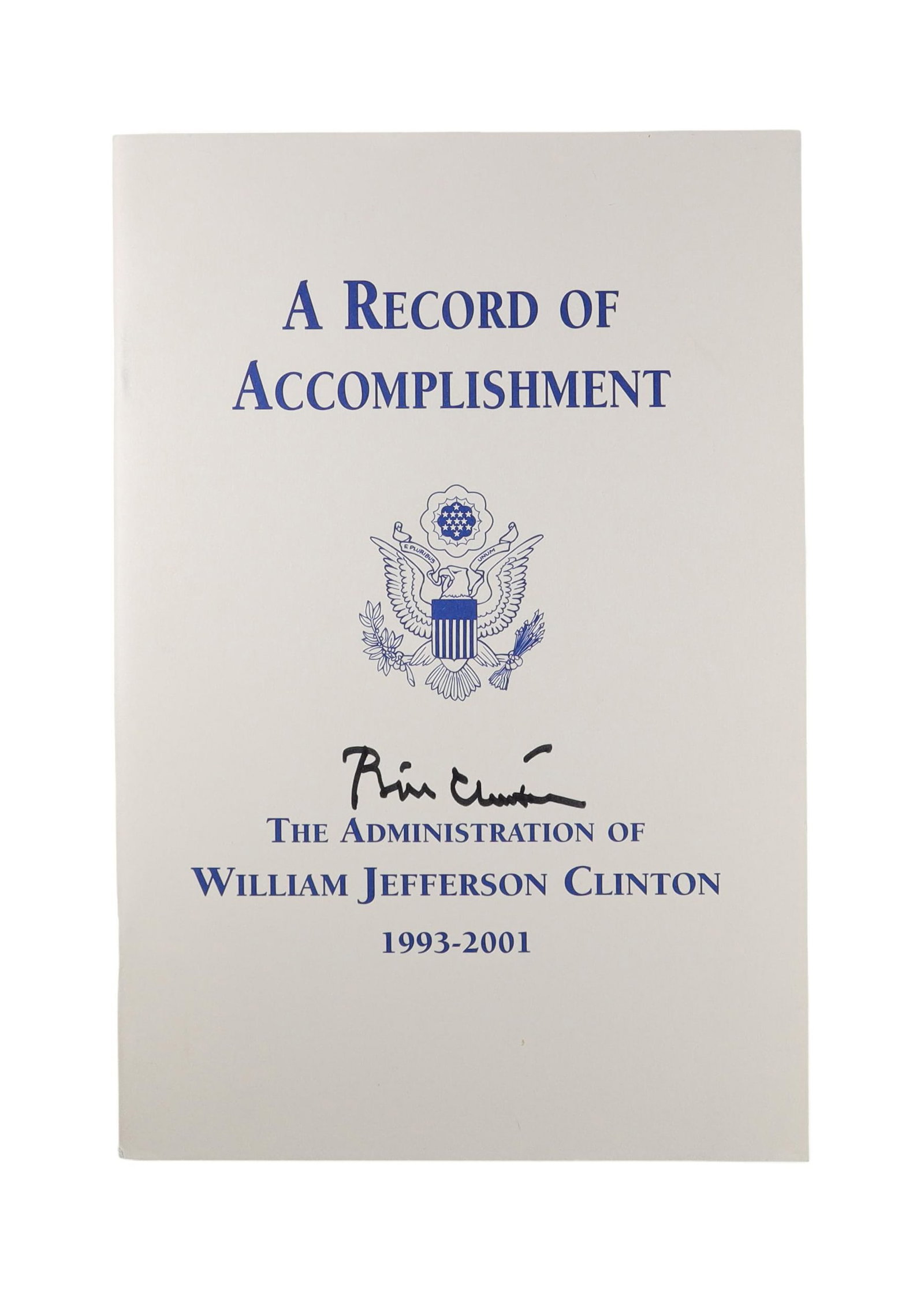 Bill Clinton Signed 'A Record of Accomplishment: The Administration of William Jefferson Clinton: An official White House end of administration summary booklet signed by President Clinton in black ink on the cover below the Presidential Seal. These booklets were produced by the Clinton White House