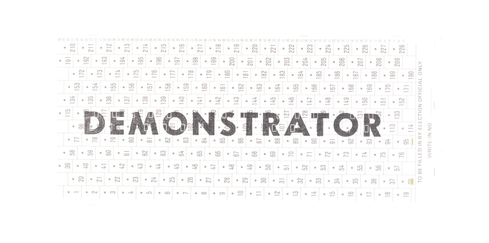'Demonstrator' Punch Card Ballot Sample Voting Card with 228 Numbered Positions: An original "DEMONSTRATOR" punch card ballot, marked with 228 numbered positions and stamped "DEMONSTRATOR" in large block letters across the center. The right edge carries "TO BE FILLED IN BY ELECTIO