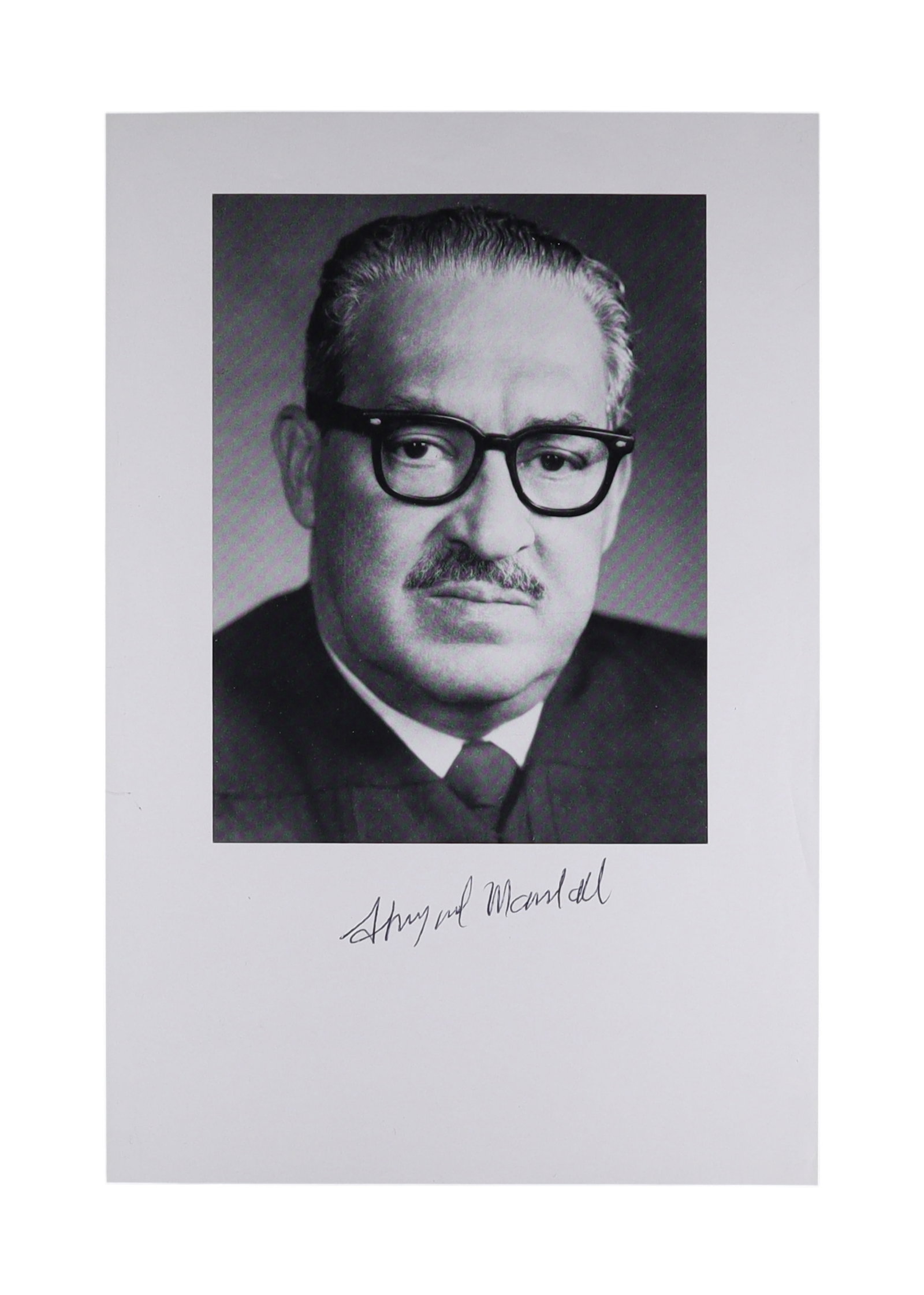 THURGOOD MARSHALL SIGNED PORTRAIT PHOTOGRAPH AND SIGNED FIRST DAY COVER: Thurgood Marshall (1908-1993) occupies a singular position in American legal history. Before President Lyndon Johnson appointed him to the Supreme Court in 1967, he had already argued and won Brown v.