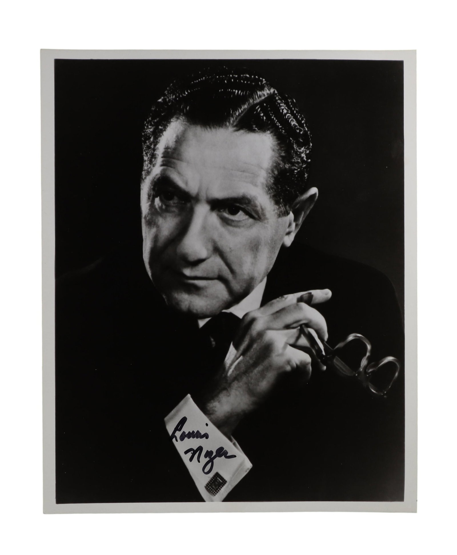 LOUIS NIZER SIGNED PORTRAIT PHOTOGRAPH AMERICA'S MOST CELEBRATED TRIAL LAWYER Louis Nizer was the: Louis Nizer was the preeminent courtroom presence of mid twentieth century American law, the New York attorney whose victories in landmark defamation, entertainment, and civil cases made him a nationa