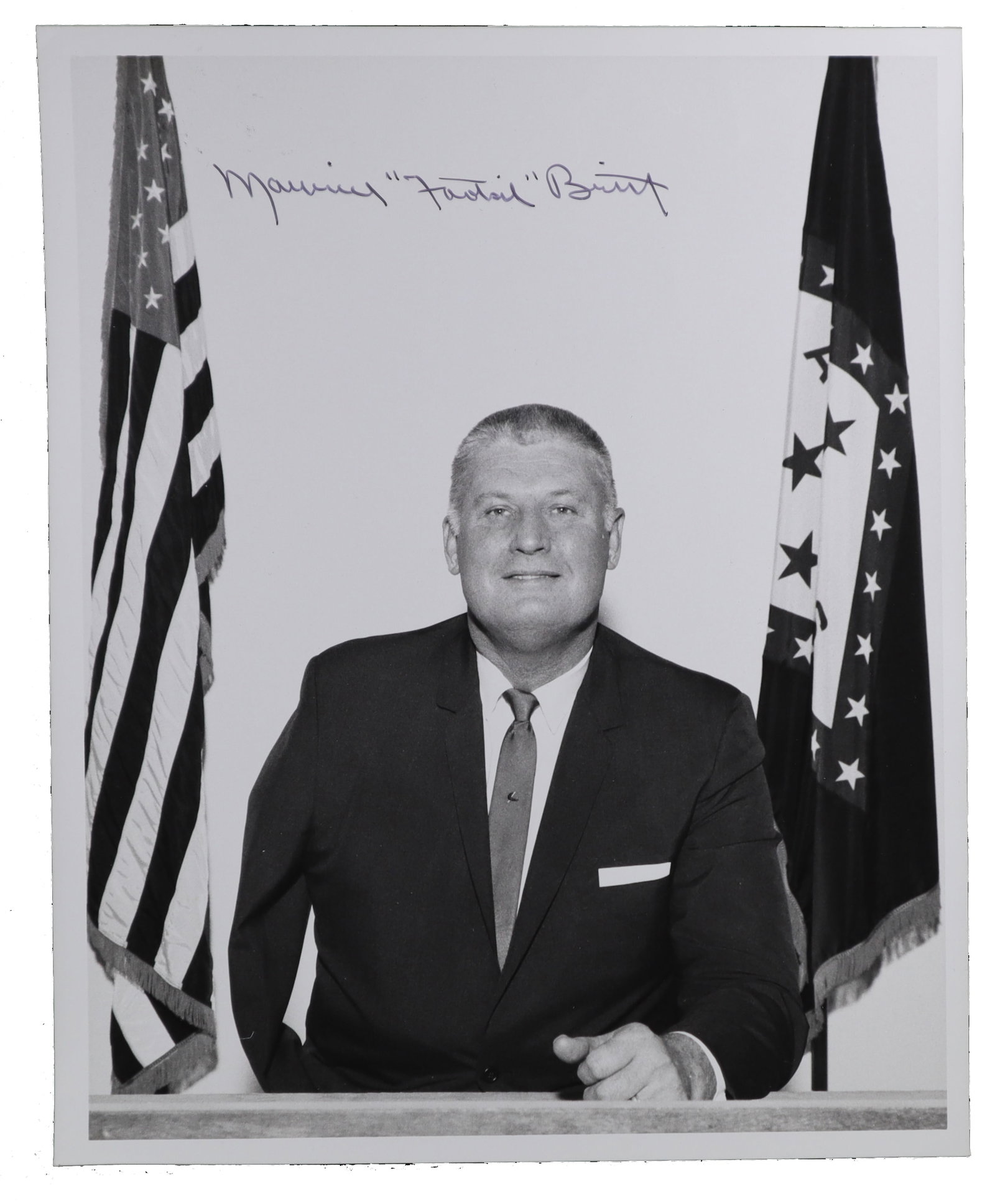 MAURICE "FOOTSIE" BRITT SIGNED OFFICIAL PORTRAIT PHOTOGRAPH MEDAL OF HONOR RECIPIENT AND ARKANSAS: Maurice "Footsie" Britt earned the Medal of Honor in Italy in November 1943, the first man to receive the decoration in the European theater of World War II. A former professional football player with