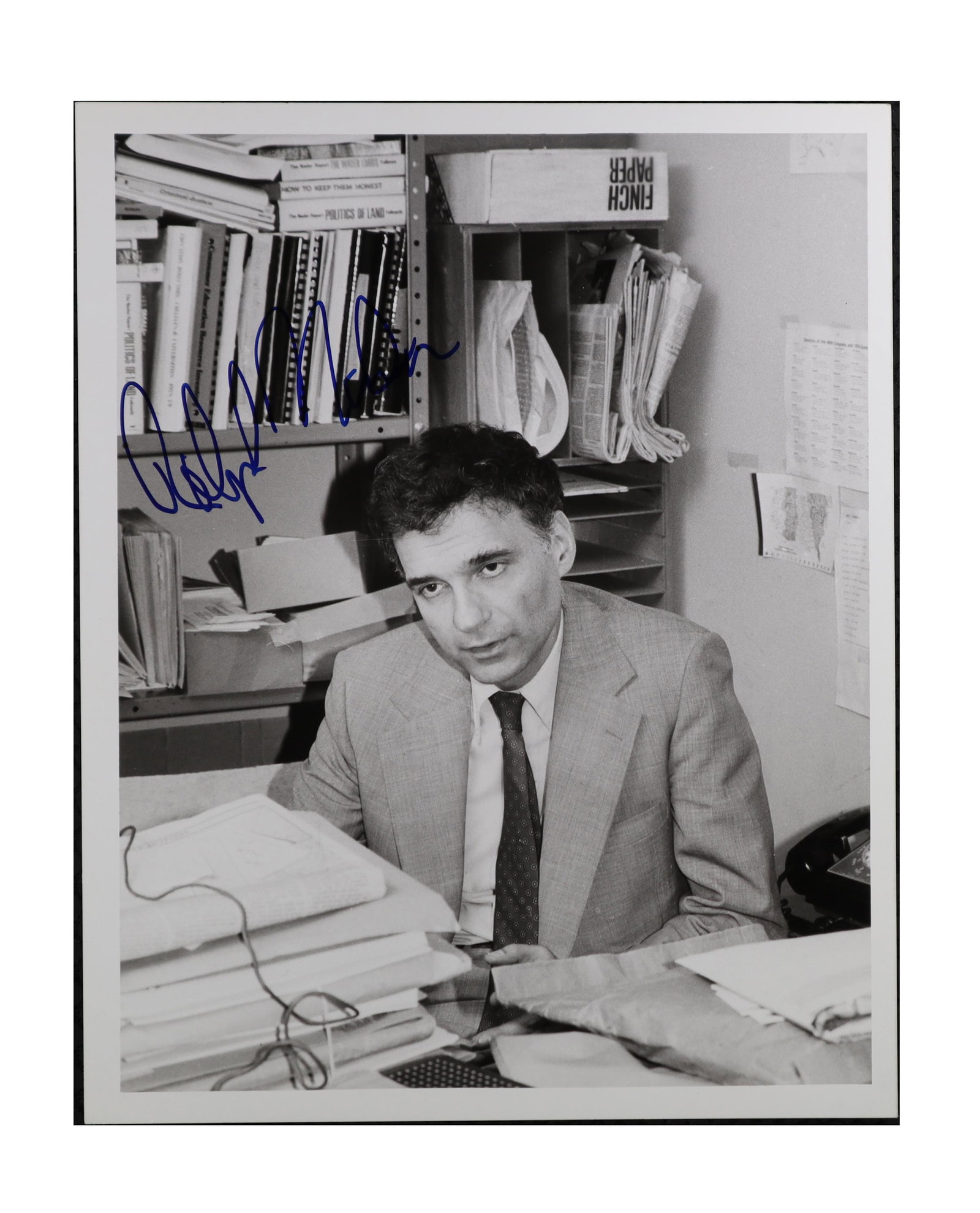 RALPH NADER SIGNED BLACK AND WHITE PRESS PHOTOGRAPH CONSUMER ADVOCATE AND PERENNIAL PRESIDENTIAL: Ralph Nader reshaped American consumer and safety law more profoundly than almost any figure of the postwar era, his 1965 book on automobile safety triggering federal legislation that has saved hundre