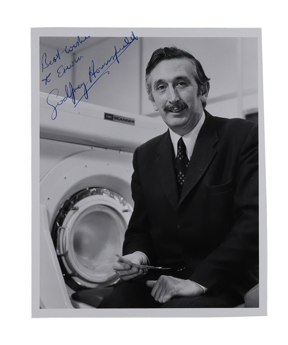 Godfrey Hounsfield Signed Photograph with CT Scanner: Nobel Laureate Inventor of the CAT Scan: Godfrey Hounsfield Signed with CT: Nobel Laureate Inventor of the CAT Godfrey Hounsfield (1919-2004), the British electrical engineer who invented the computed tomography (CT) and shared the 1979 Nobe