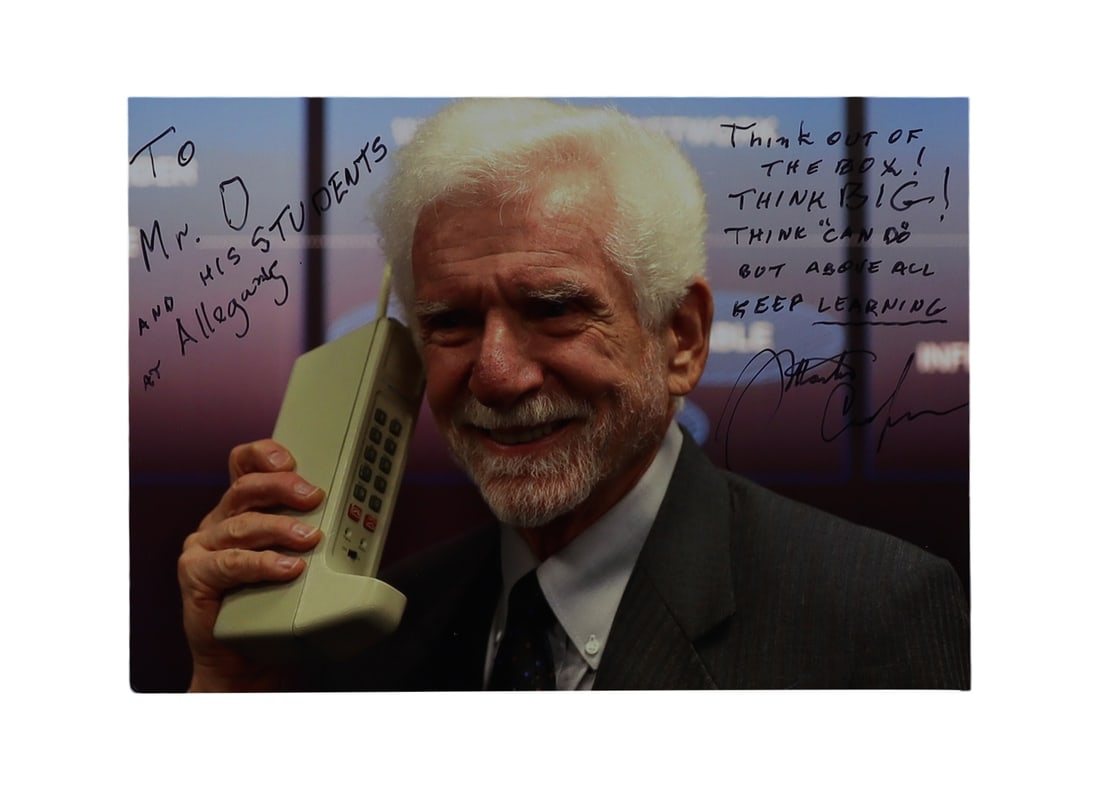 Martin Cooper Signed Color Photo Holding the First Cell Phone Inventor of the Handheld Cellular: Martin Cooper Signed Color the First Cell Phone, Inventor of the Handheld Cellular Telephone, with Extensive Educational Inscription Martin Cooper (born 1928), the Motorola engineer who made the world