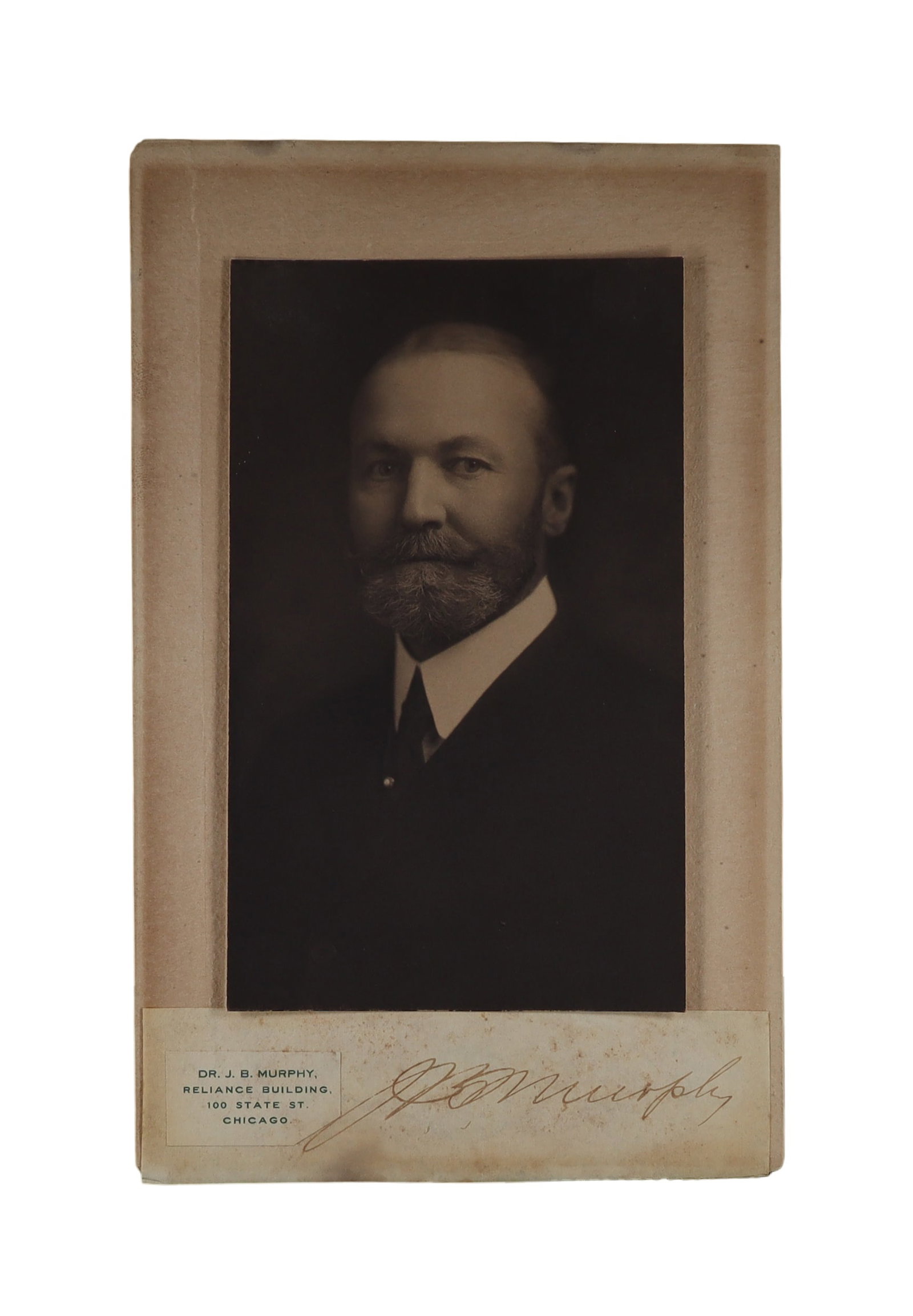 J.B. Murphy Signed Cabinet Card One of America's Greatest Surgeons at the Turn of the Century: John B. Murphy, M.D. (1857-1916), the Chicago surgeon regarded by many contemporaries as the most brilliant American operator of his era, signed his name in flowing sepia ink below this formal mounted