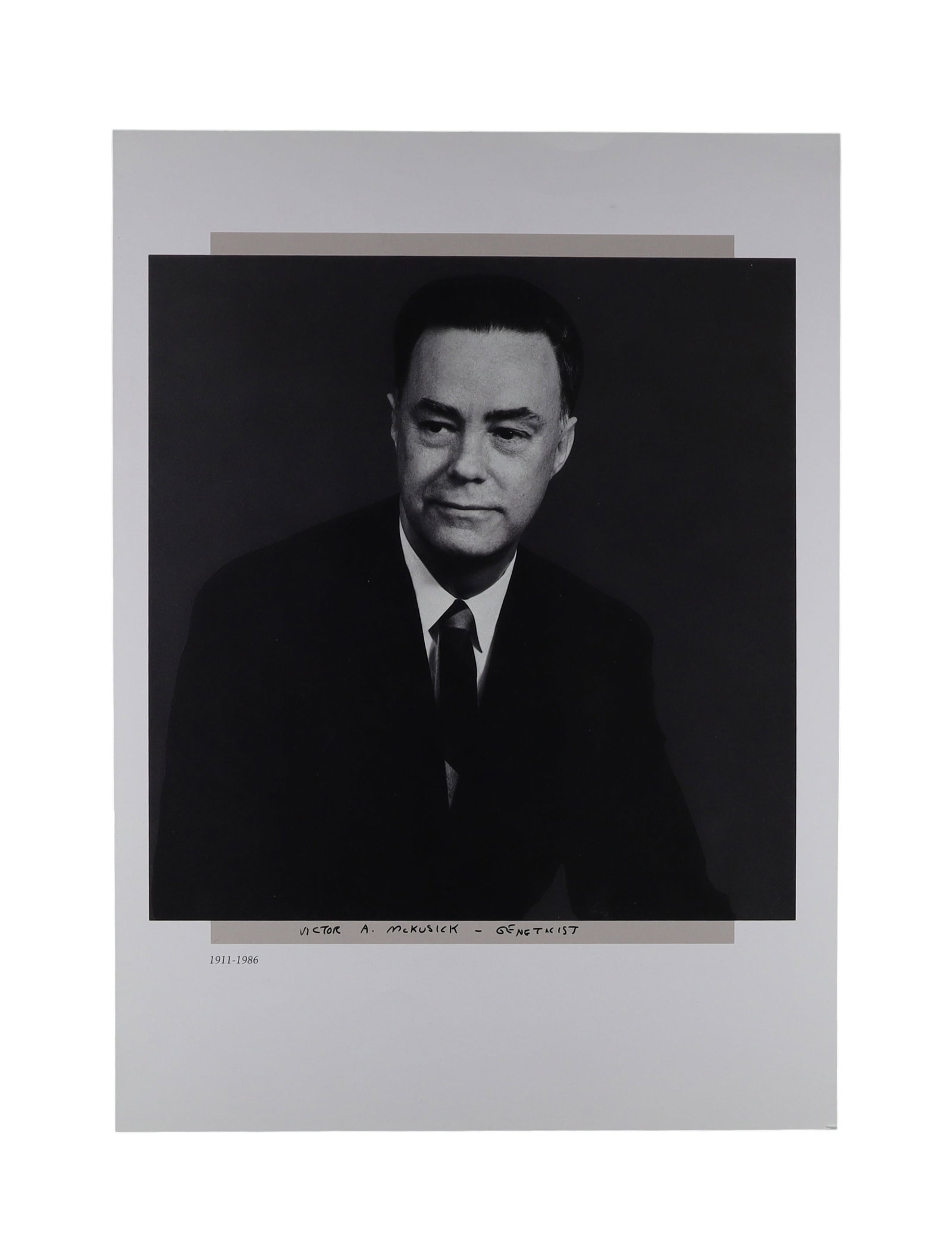 Victor McKusick Signed Color Photograph Father of Medical Genetics: McKUSICK SIGNED COLOR, "Father of Medical Genetics" Victor A. McKusick (1921-2008), the Johns Hopkins physician universally regarded as the father of medical genetics, signed his name in black ink bel