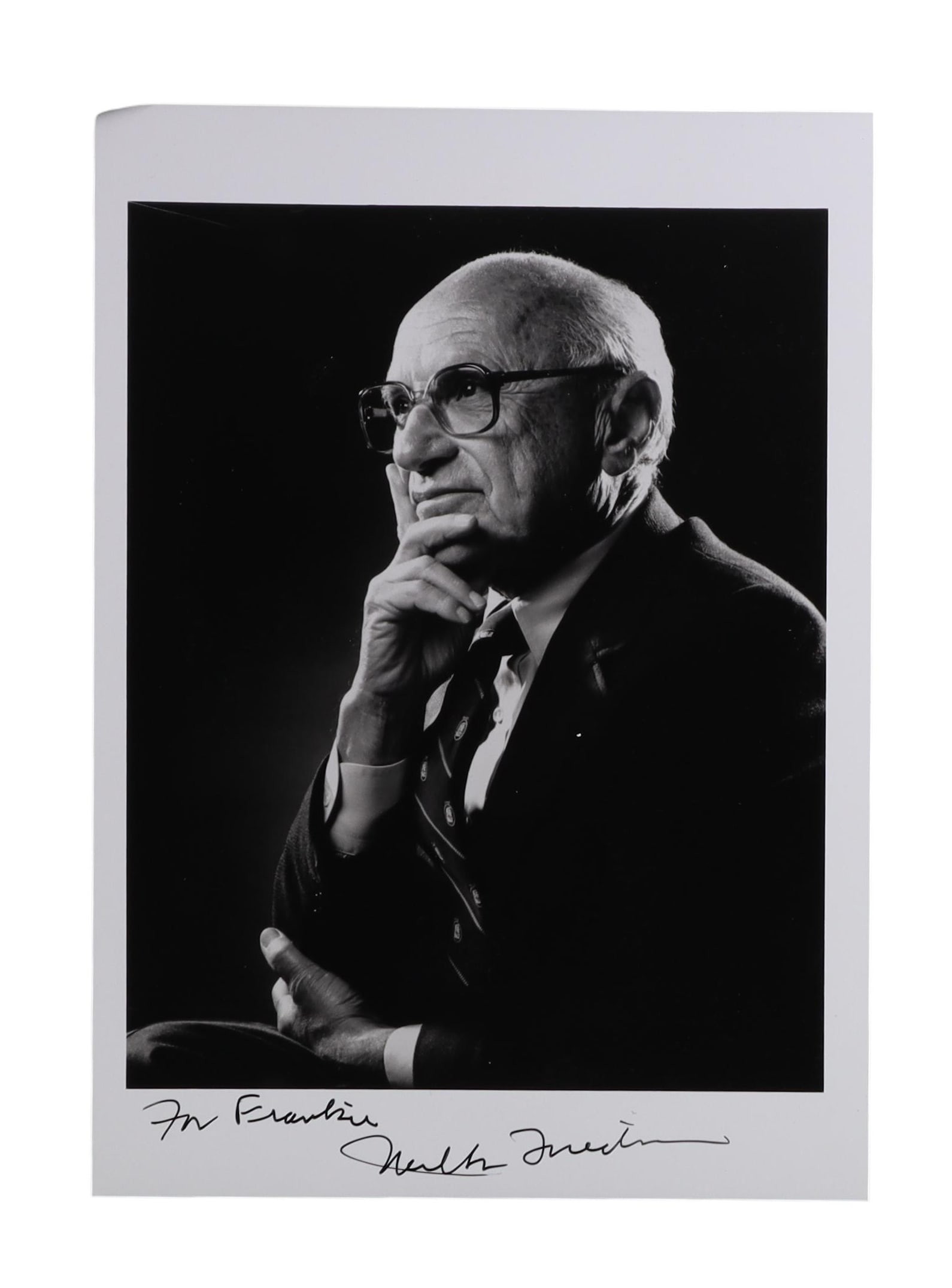 MILTON FRIEDMAN SIGNED INSCRIBED PORTRAIT PHOTOGRAPH NOBEL LAUREATE AND THE ARCHITECT OF FREE MARKET: Milton Friedman won the Nobel Prize in Economic Sciences in 1976 and spent half a century as the most influential advocate for free markets, monetarism, and limited government in the English speaking 